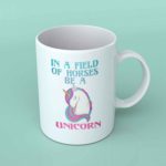 In a field of horses be a unicorn coffee mug
