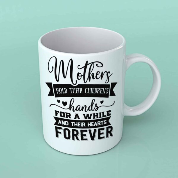 Mothers hold their children's hand for a while coffee mug