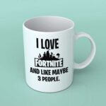 I Love fortnite and like maybe 3 people coffee mug