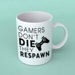 Gamers don't die they respawn coffee mug
