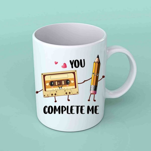 You complete me cassette and pencil coffee mug