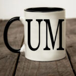 Cum black and white coffee mug